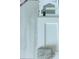 Selection of interior design elements including flooring, cabinet door, paint swatches, and countertop sample at 13187 Gulf Bay Ln, Spring Hill, FL 34609