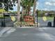 Community entrance gate with the name Orange Blossom Ranch and manicured landscaping at 4622 Blossom Blvd # D, Zephyrhills, FL 33542