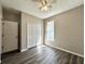 Neutral bedroom with wood floors and good natural lighting at 6212 Abbott Station Dr, Zephyrhills, FL 33542