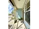 A screened in front porch with potted plants at 6212 Abbott Station Dr, Zephyrhills, FL 33542