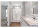 Bathroom featuring a shower with glass door, and vanity at 13024 Dania St, Hudson, FL 34667