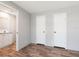 Bedroom that has an ensuite bathroom and two closets at 13024 Dania St, Hudson, FL 34667