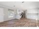 The kitchen features stainless steel appliances and an open-concept floor plan at 13024 Dania St, Hudson, FL 34667