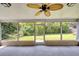 A spacious screened patio with views of the lush backyard at 2140 N Bay Hills Blvd, Safety Harbor, FL 34695