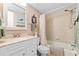 Compact bathroom with a shower-tub combo, vanity with sink, and neutral wall color at 2756 Clubhouse Dr # 101, Sarasota, FL 34232
