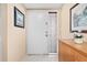 Bright entryway featuring tile floors, a side light, and a classic wood cabinet at 2756 Clubhouse Dr # 101, Sarasota, FL 34232