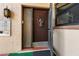 Charming condo front door featuring a decorative wreath and adjacent window at 2756 Clubhouse Dr # 101, Sarasota, FL 34232