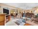 Bright and airy living room with access to a screened lanai, perfect for indoor-outdoor living and entertaining at 2756 Clubhouse Dr # 101, Sarasota, FL 34232
