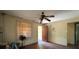 Spacious bedroom with window, ceiling fan and doorway at 655 36Th S Ave, St Petersburg, FL 33705