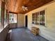 Spacious porch with wooden ceiling and fan at 655 36Th S Ave, St Petersburg, FL 33705