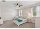 Cozy bedroom offers natural light and plush carpeting at 12905 Satin Lily Dr, Riverview, FL 33579