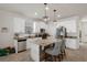 Stylish kitchen with white cabinets, stainless appliances, and granite countertops at 12905 Satin Lily Dr, Riverview, FL 33579