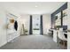 This room has 2 desks, a coatrack and a large window at 9122 Gibralter St, Spring Hill, FL 34608