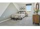 Bedroom with a plaid bed, two-tone paint, three-piece art, and dresser at 30948 Silver Stage Dr, Brooksville, FL 34602