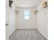 Walk-in closet with shelving and a window to provide natural light at 30948 Silver Stage Dr, Brooksville, FL 34602