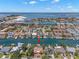 Aerial view of waterfront property with easy ocean access and a private boat dock at 852 3Rd Ave S, Tierra Verde, FL 33715