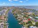 Stunning aerial view of waterfront home with boat access in a beautiful neighborhood at 852 3Rd Ave S, Tierra Verde, FL 33715