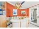 Cozy breakfast nook with custom seating, bright colors, and lots of light at 852 3Rd Ave S, Tierra Verde, FL 33715