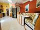 Sunny breakfast nook with a skylight, custom seating, and a seamless flow into the adjacent kitchen space at 852 3Rd Ave S, Tierra Verde, FL 33715