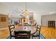 Elegant dining area with hardwood floors and large round table, ideal for gatherings and Gathering meals at 852 3Rd Ave S, Tierra Verde, FL 33715