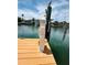 Private dock with utility pole on the water for your boats and toys at 852 3Rd Ave S, Tierra Verde, FL 33715