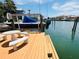 Private boat dock with lift provides direct access to the waterway at 852 3Rd Ave S, Tierra Verde, FL 33715