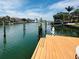 Waterfront living at its finest with a private dock and access to the canal at 852 3Rd Ave S, Tierra Verde, FL 33715