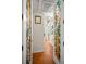 Hallway featuring decorative doors, wood floors, and recessed lighting at 852 3Rd Ave S, Tierra Verde, FL 33715