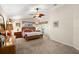 Comfortable main bedroom featuring a wicker bed, a ceiling fan, and lots of natural light at 852 3Rd Ave S, Tierra Verde, FL 33715