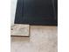Close up of flooring and cabinet door, showing the material for a kitchen or bathroom at 13362 Quigley Ave, Weeki Wachee, FL 34614