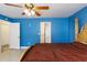 Spacious bedroom featuring tile floors, and adjacent bathroom at 4318 River Birch Dr, Spring Hill, FL 34607