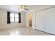 Bright bedroom with tile floor, double closet, and neutral paint at 4318 River Birch Dr, Spring Hill, FL 34607