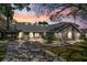 Beautiful one-story home featuring a neutral exterior, a brick driveway, and ample natural light from skylights at 4318 River Birch Dr, Spring Hill, FL 34607