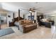 Spacious main bedroom with bed, workstation, and tile floors at 4318 River Birch Dr, Spring Hill, FL 34607