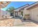 Inviting backyard patio area with seating, plants, and well-maintained exterior at 7102 Silvermill Dr, Tampa, FL 33635