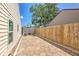 Spacious backyard with a paver patio, ideal for outdoor entertaining or relaxing in a private setting at 7102 Silvermill Dr, Tampa, FL 33635