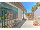 Charming patio area with beautiful plants and outdoor decor for a serene, relaxing backyard experience at 7102 Silvermill Dr, Tampa, FL 33635