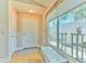 Bright foyer with wood floors and large window overlooking the courtyard at 7102 Silvermill Dr, Tampa, FL 33635