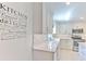 Bright, updated kitchen with white cabinetry, subway tile backsplash, and modern appliances at 7102 Silvermill Dr, Tampa, FL 33635