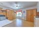 Bright living room features built-in cabinetry, a murphy bed, and a large window for ample sunlight at 7102 Silvermill Dr, Tampa, FL 33635