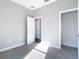 Bedroom featuring neutral carpet and two closets at 2223 Hattie Ct, North Port, FL 34288
