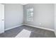 Bedroom featuring neutral carpet and a window to the fenced backyard at 2223 Hattie Ct, North Port, FL 34288