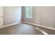 Bedroom featuring neutral tones, carpet flooring, and a window at 2423 Sadnet Ln, North Port, FL 34286