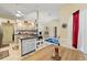 Kitchen and dining area with island and modern tile backsplash and seating at 5188 Elwood Rd, Spring Hill, FL 34608