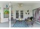 Outdoor patio featuring ample seating, ceiling fan, and decor for relaxing or entertaining guests at 5188 Elwood Rd, Spring Hill, FL 34608