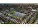 Beautiful aerial view of a lakeside community with lush landscaping and ponds at 1739 Broad Winged Hawk Dr, Ruskin, FL 33570