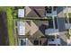 Top-down aerial view of neighborhood homes, showing rooflines and driveways at 1739 Broad Winged Hawk Dr, Ruskin, FL 33570