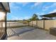 Backyard overlooking a picturesque lake, fenced yard and a concrete patio perfect for outdoor enjoyment at 1739 Broad Winged Hawk Dr, Ruskin, FL 33570