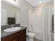 Bathroom featuring a sink, toilet, and tub with shower at 1739 Broad Winged Hawk Dr, Ruskin, FL 33570