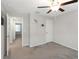 A sunlit bedroom with neutral walls and carpet offers comfort and style at 1739 Broad Winged Hawk Dr, Ruskin, FL 33570